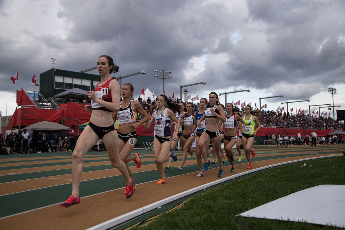The women's 1500m final on a cloudy Saturday. The lead would eventually be taken by the University of Toronto's Gabriela Stafford (#10).