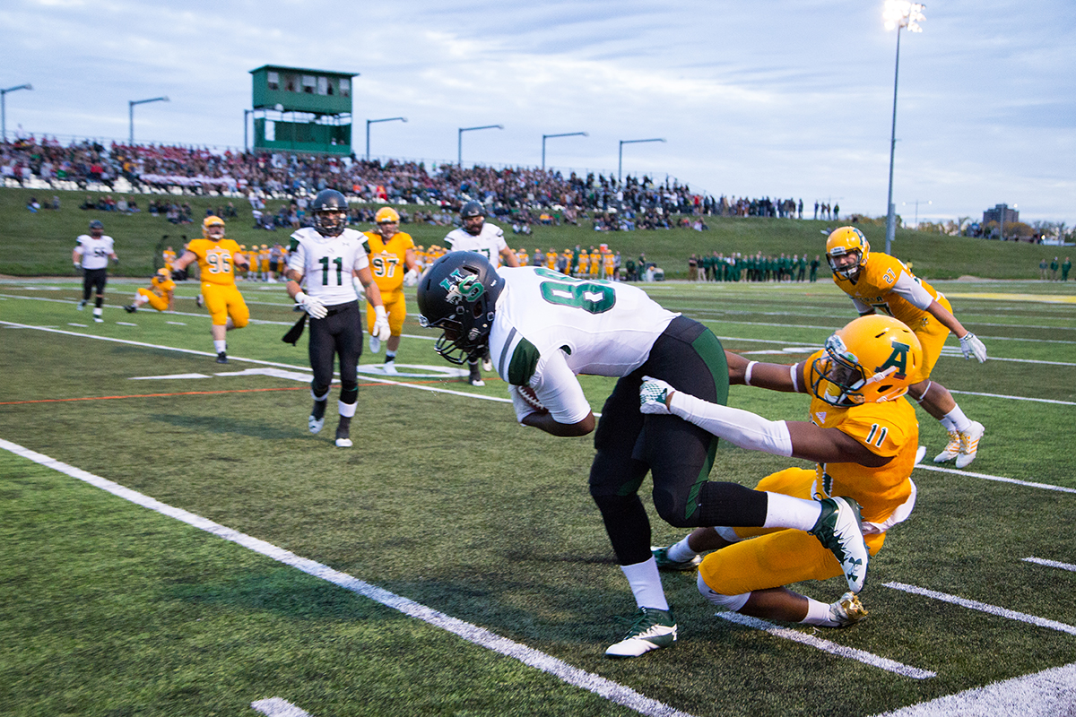 Shaydon Philip slows the Huskies offence.