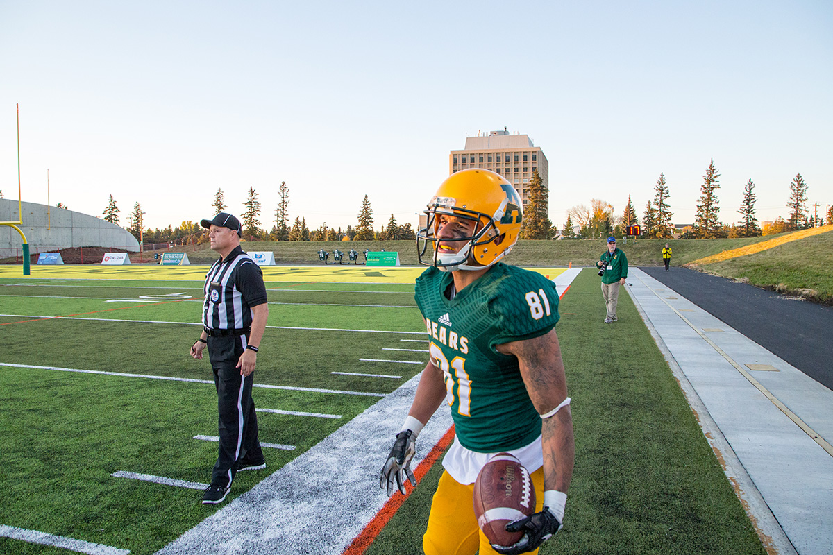 Golden Bears wide receiver Tylor Henry comes off after another disappointing offensive series. 