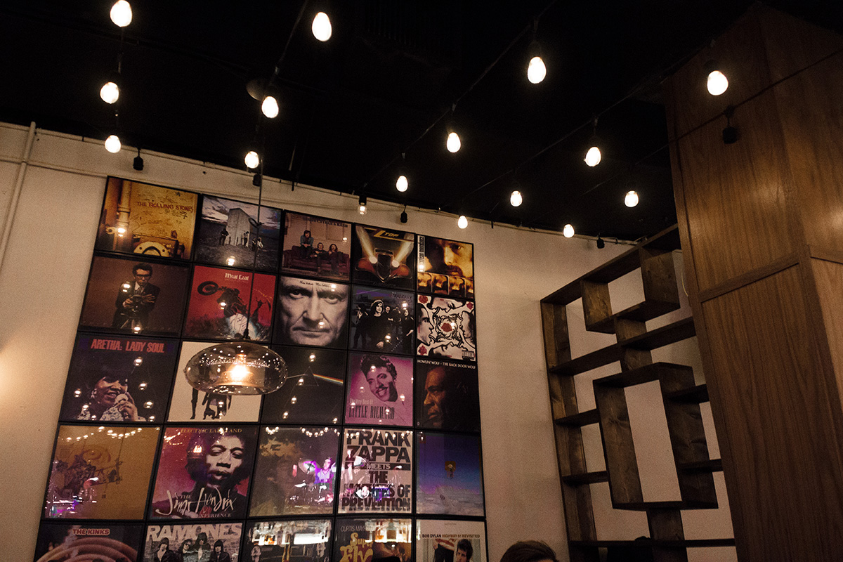 The dining lounge is decorated with collages consisting of some of the most iconic album covers of all time.