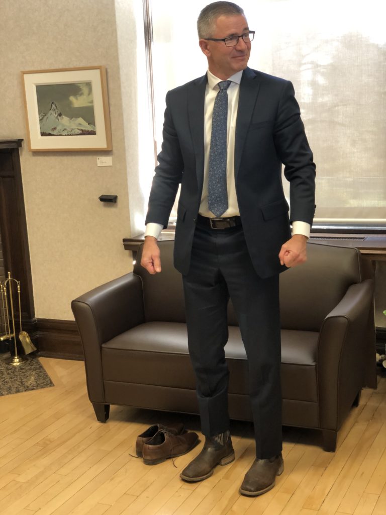 Saskatchewan finance minister reveals new 'tight' shoes in advance of  budget day