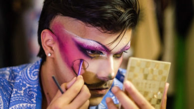 person putting on drag makeup
