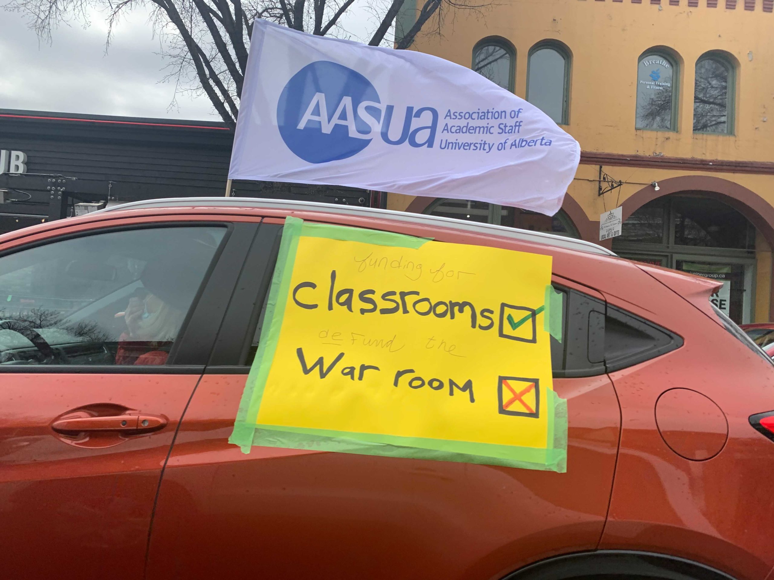 Honk if you love postsecondary Car caravan protests Honk if you love postsecondary Car caravan protests