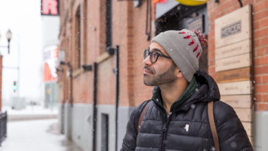 man standing on street