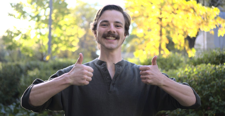 A photo of Stephen Raitz with two thumbs up.