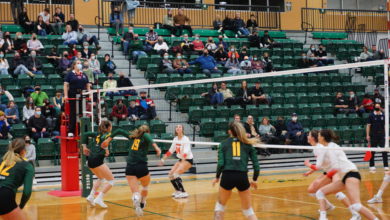 The Pandas play the University of Calgary Dinos in a volleyball game on November 27, 2021.
