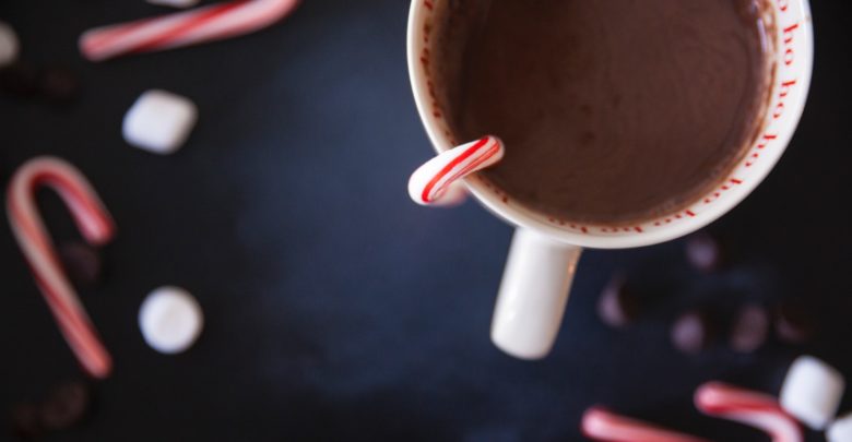 coffee with a candy cane in the drink mug