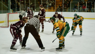 The Golden Bears and Griffins face off in a hockey game on December 4, 2021.