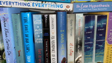 A shelf full of books commonly seen on BookTok