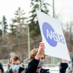 AASUA poster protest budget cuts 2022 march