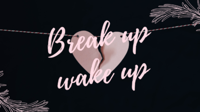 A photo of a paper heart on a line ripping, with the text "Break up wake up" on it. (Kelly Sikkema on Unsplash)