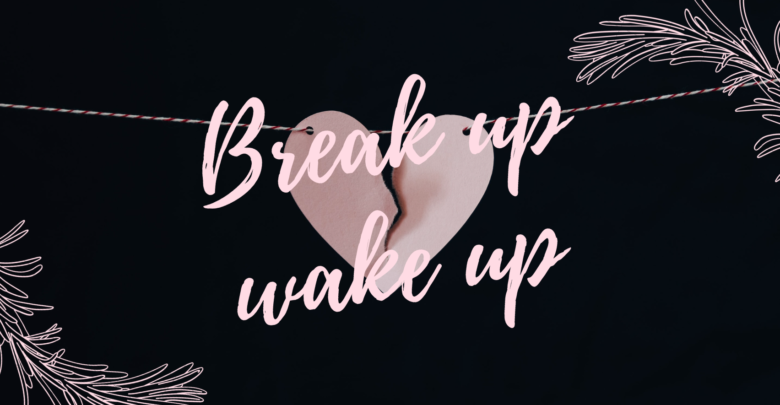 A photo of a paper heart on a line ripping, with the text "Break up wake up" on it. (Kelly Sikkema on Unsplash)