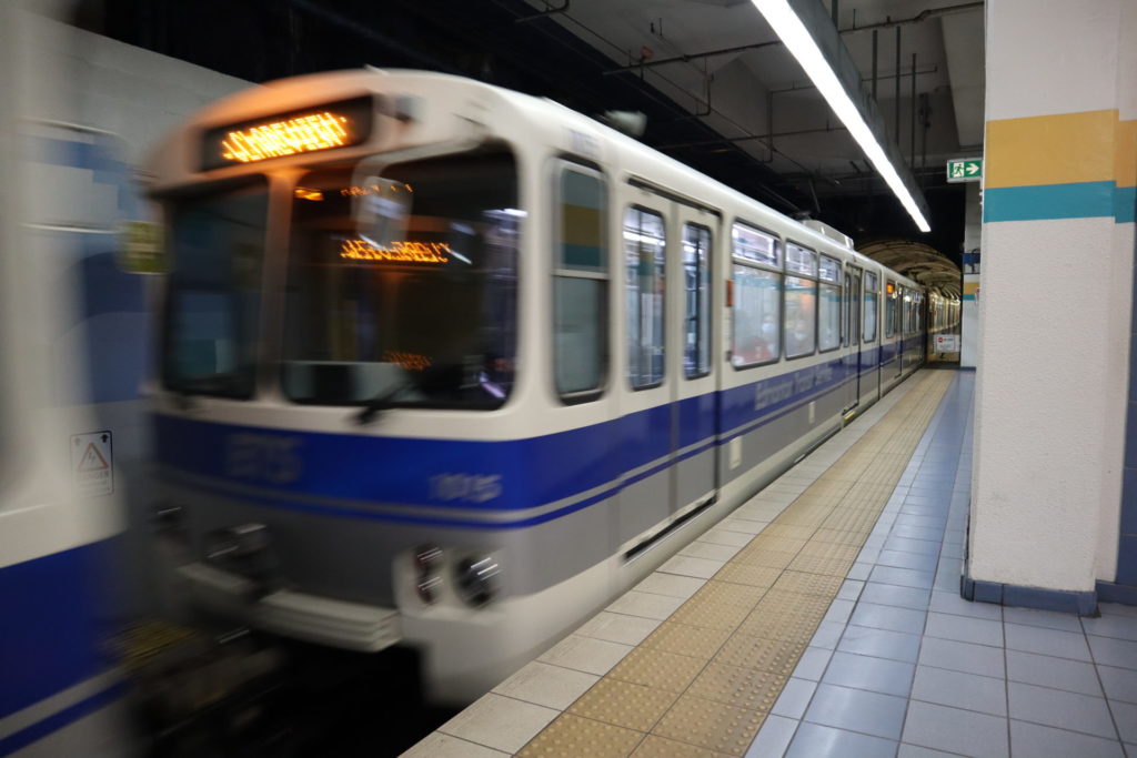 A photo of a blurry LRT train heading to the platform