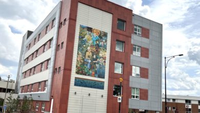 The outside of the Canterbury Cares building showing the mural
