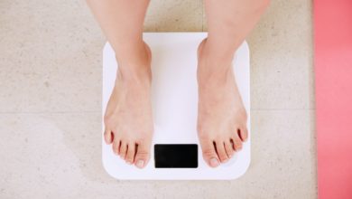 Photo by: I Yunmai, person standing on a weight scale