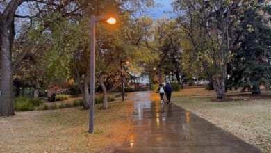 two people walking on University of Alberta's campus