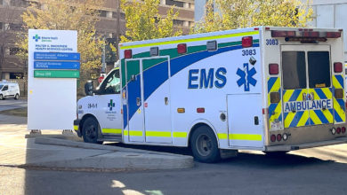 emergency ambulance standing outside Walter C. Mackenzie Health Sciences Centre