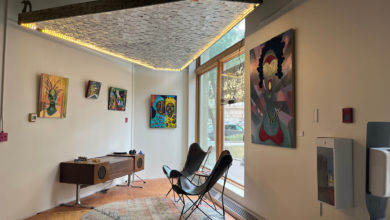 Main exhibition viewing area of Elsa Robinson's exhibit The Village That Surrounds Me