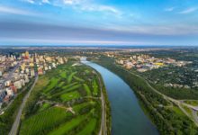 Aerial view of downtown Edmonton and campus, facing east, north Saskatchewan river