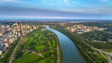 Aerial view of downtown Edmonton and campus, facing east, north Saskatchewan river