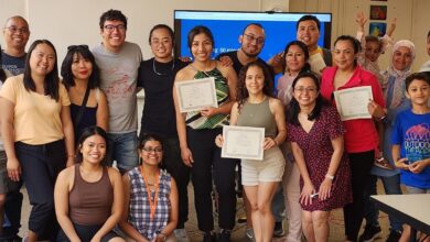 Nirupama Rajan (pictured bottom row, second from the left) at a Migrante Alberta event.